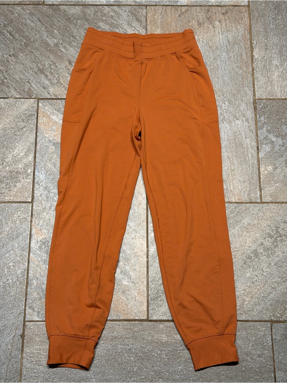 Fabletics Rust Orange Track Joggers